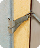 S/S banding clips are looped under each anchor cable and olded over the metal jacket edge flange, securing ThermaSeam to the wall ThermaSeam Tank Insulation: Installation Clips
